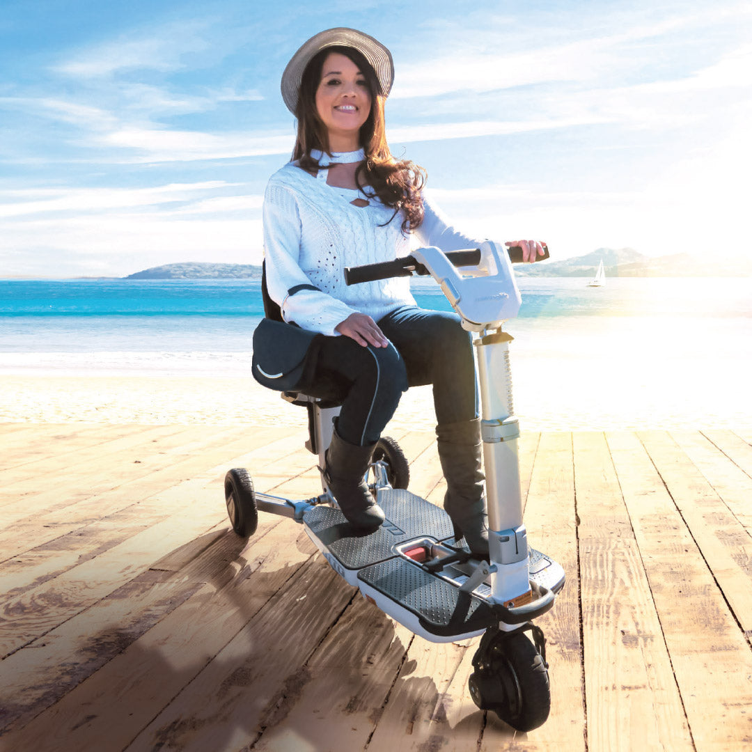 yound person with MS on a mobility scooter