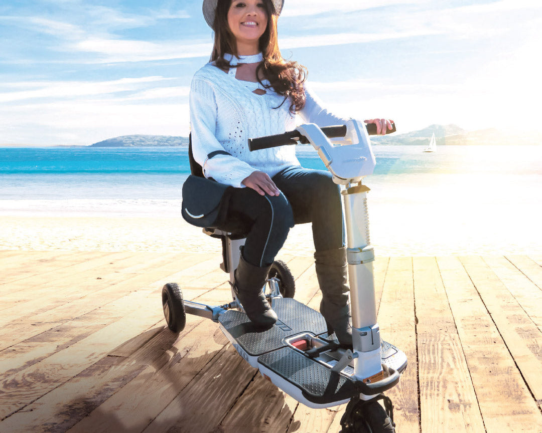 yound person with MS on a mobility scooter
