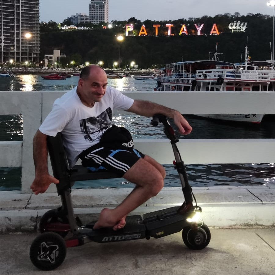 A movinglife customer with their foldable and portable mobility scooter